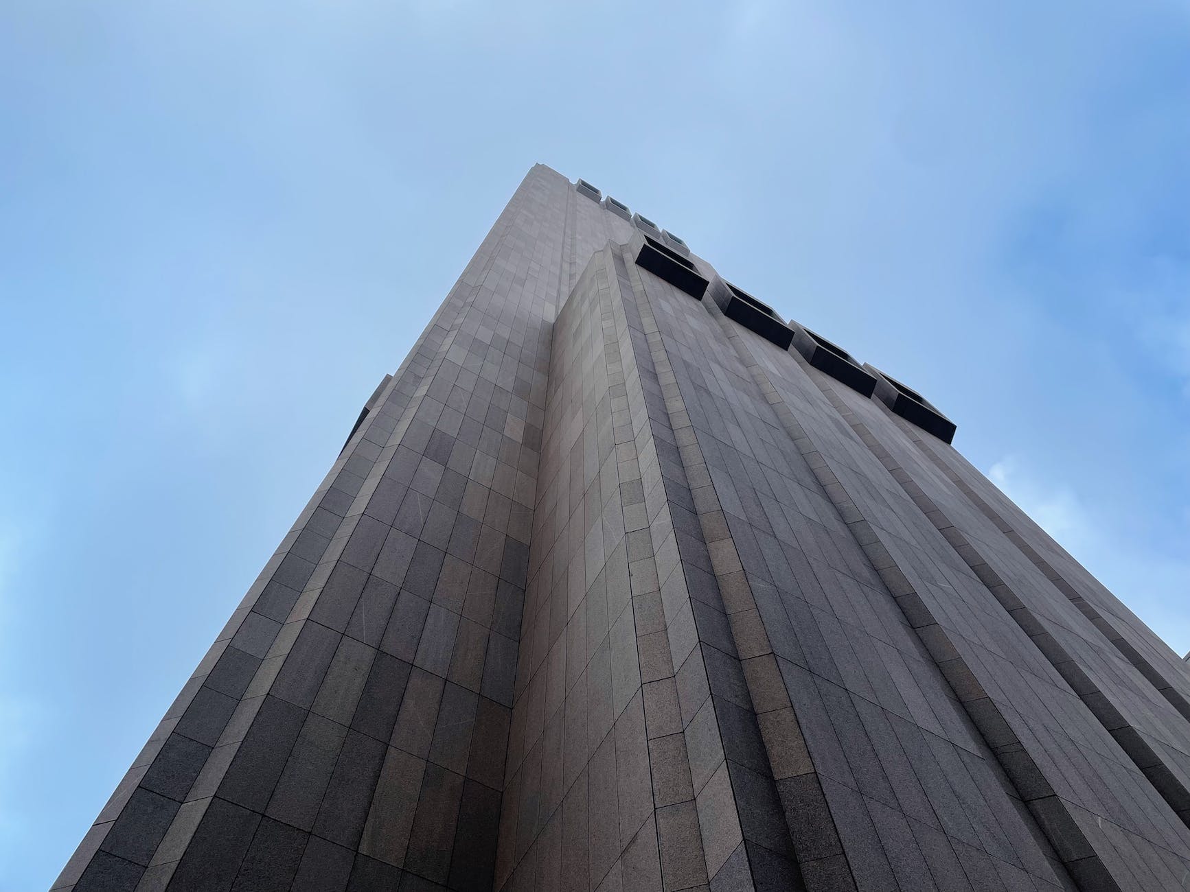 low angle shot of a high rise concrete building