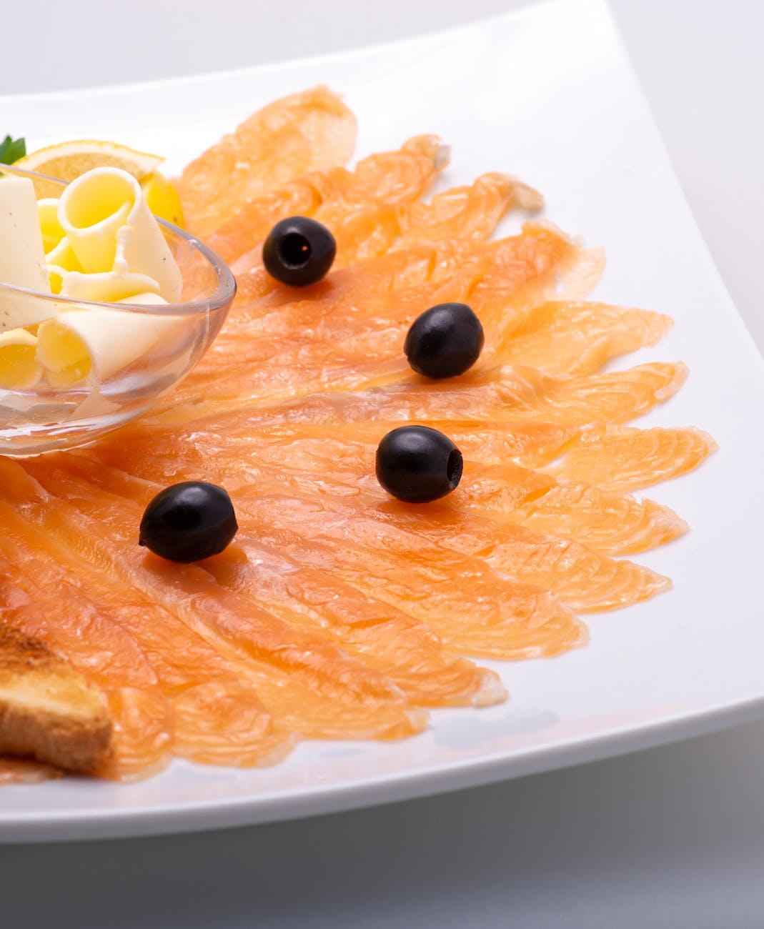 sliced smoked salmon on a plate