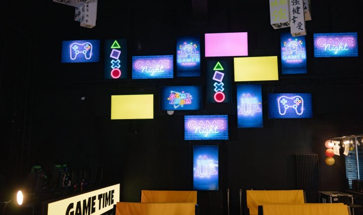 neon signages inside a computer gaming shop