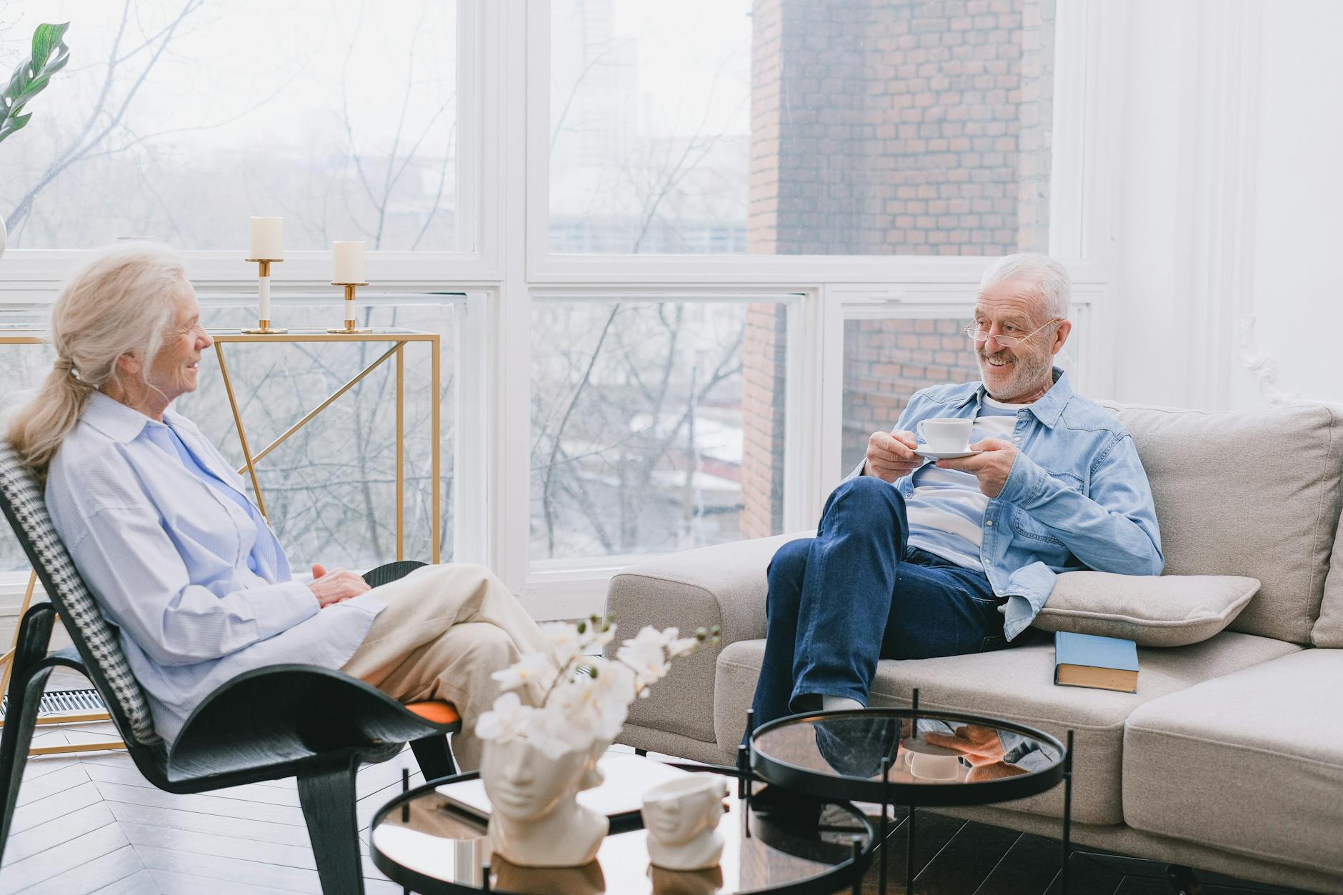 an elderly couple talking together